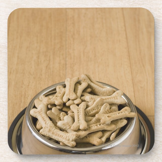 Close-up of dog biscuits in a dog bowl coaster (Front)