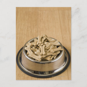 Close-up of dog biscuits in a dog bowl postcard