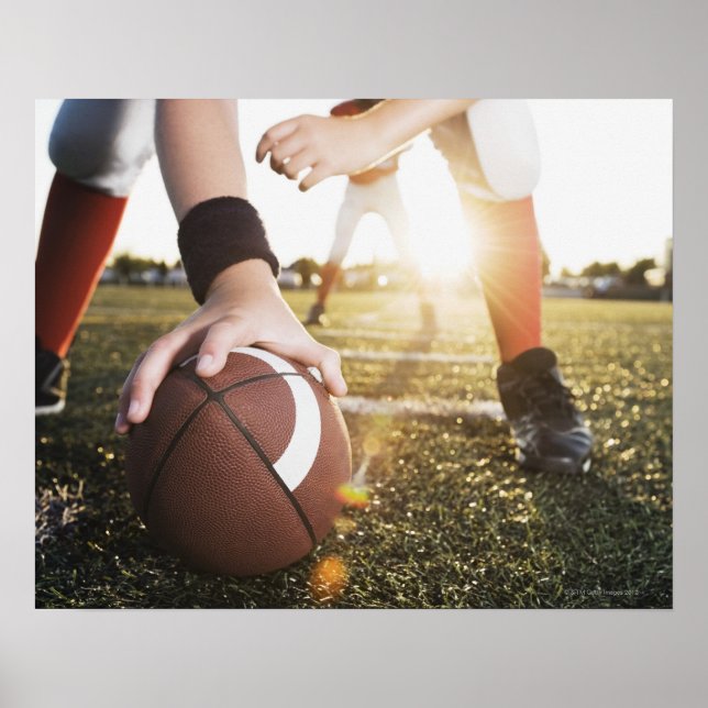 Close up of football centre preparing to snap poster (Front)