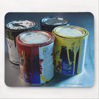 Close-up of four paint cans mouse mat