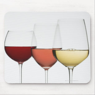 Close up of glasses of different wines mouse mat