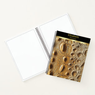 Close-up of intricate snakeskin texture notebook