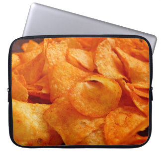 Close up of juicy, crispy, chips on black plate. laptop sleeve