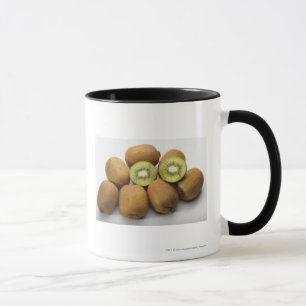 Close-up of kiwi fruits mug
