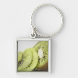 Close-up of kiwi slices key ring