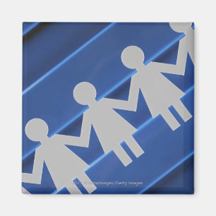 Close-up of paper chain dolls magnet