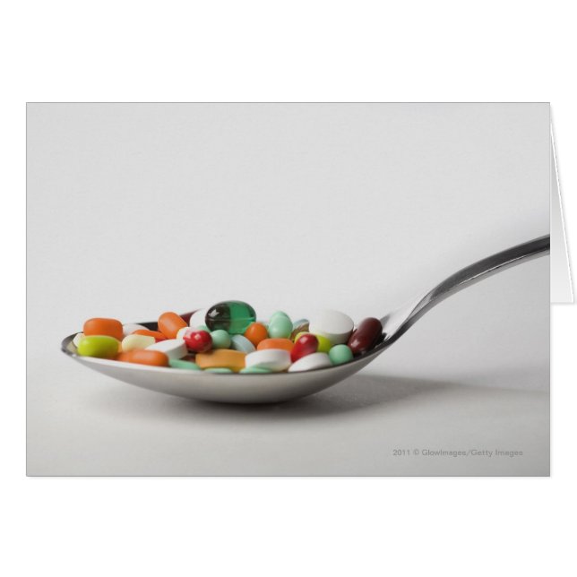 Close-up of pills in a spoon (Front Horizontal)