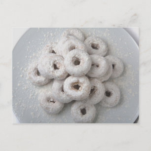 Close-up of powdered doughnuts in a plate postcard