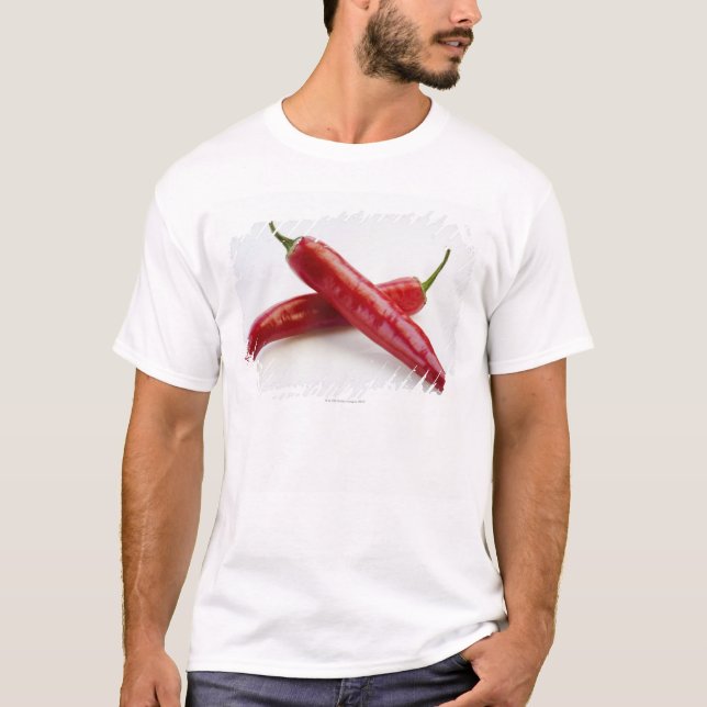 Close up of red chilli peppers on white T-Shirt (Front)