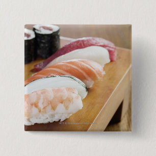 Close-up of sushi on a table 15 cm square badge