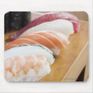 Close-up of sushi on a table mouse mat