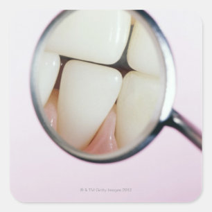 Close-up of teeth reflected in dental mirror square sticker