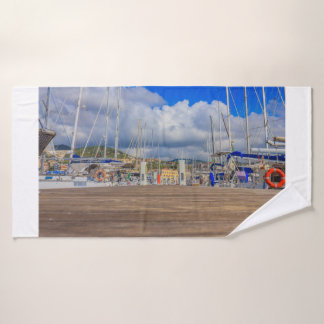 close-up of the quay of a marina  on  bath towels
