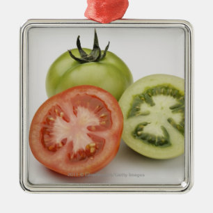 Close-up of three tomatoes metal tree decoration