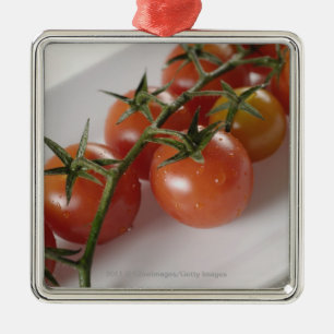 Close-up of tomatoes on a tray metal tree decoration