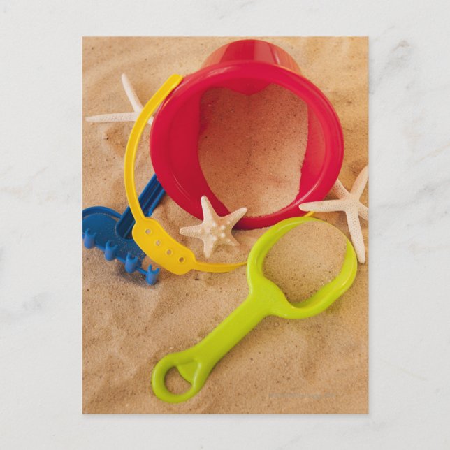 Close up of toys on sand postcard (Front)