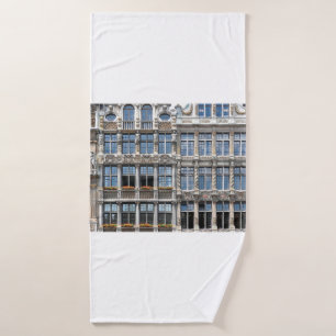 Close up of windows of famous guildhalls in Grote Bath Towel