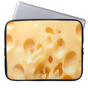 Close up of yellow cheese. This file is cleaned an Laptop Sleeve