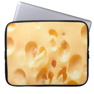 Close up of yellow cheese. This file is cleaned an Laptop Sleeve