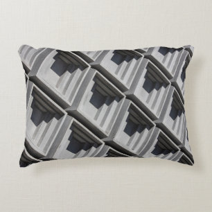 Close-up photo of gray building decorative cushion