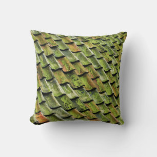Close-up photo of green shingle roof cushion