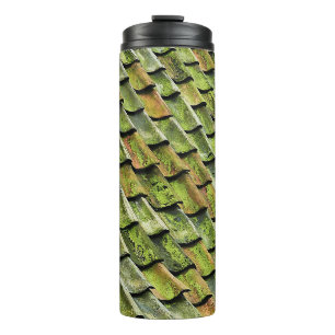 Close-up photo of green shingle roof thermal tumbler