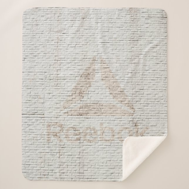 Close-up photo of Reebok logo on wall Sherpa Blanket (Front)