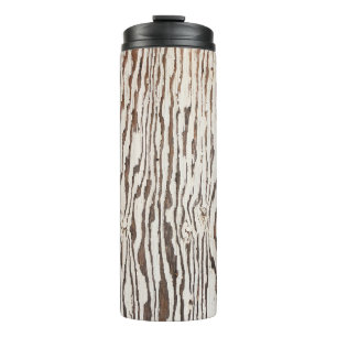 Close up photography of brown wooden surface thermal tumbler