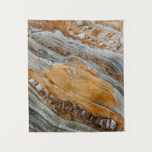 Close-up photography of grey and orange stones tapestry