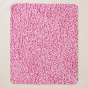 Close-up pink leather, textured background. sherpa blanket