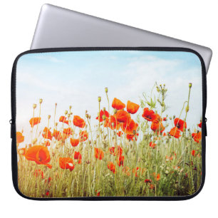 Close up poppies on field. Wild flowers in springt Laptop Sleeve