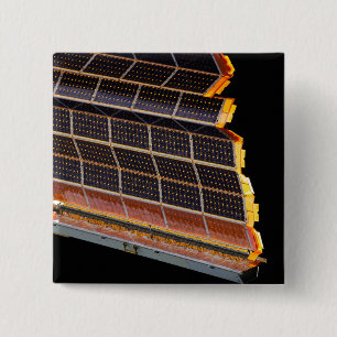 Close-up view of the solar arrays 15 cm square badge