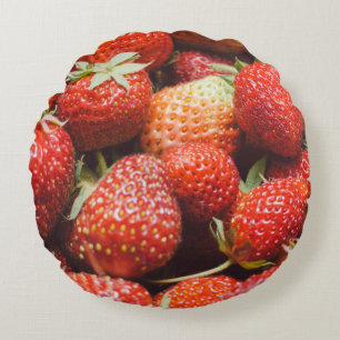 Close-up view on fresh summer strawberry with vint round cushion