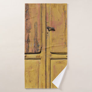 Closed brown wooden cabinet bath towel