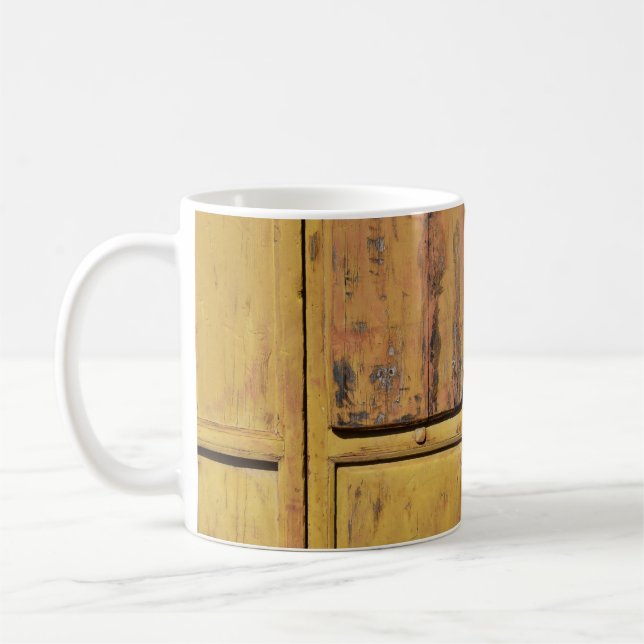 Closed brown wooden cabinet coffee mug (Left)