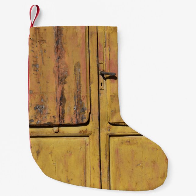 Closed brown wooden cabinet small christmas stocking (Front)