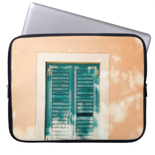 Closed green wooden door laptop sleeve