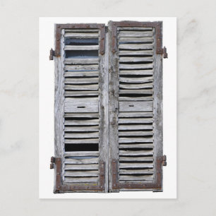 Closed window with old wood shutters postcard