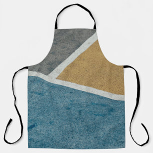 Closeup gray, yellow, and blue painted pavement apron