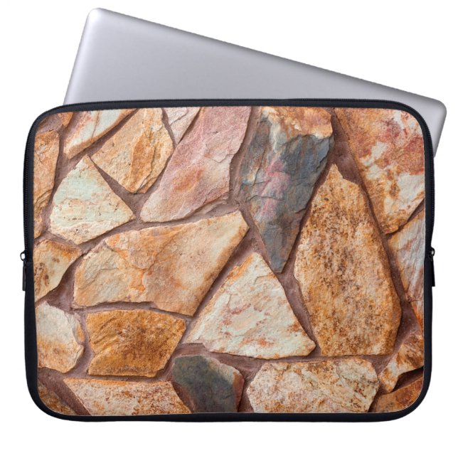 Closeup of a stone wall as a backgroundwallpaper,p laptop sleeve (Front)