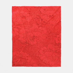 Closeup of fine elegant red lace texture with seam fleece blanket