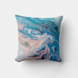 Closeup of mixed blue and white abstract marble te cushion