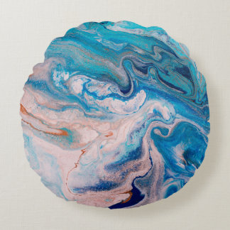 Closeup of mixed blue and white abstract marble te round cushion
