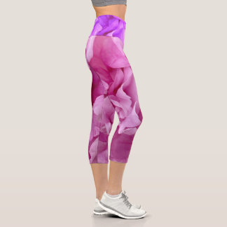 Closeup of pink peonies capri leggings