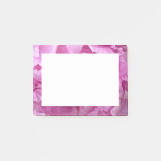Closeup of pink peonies post-it notes