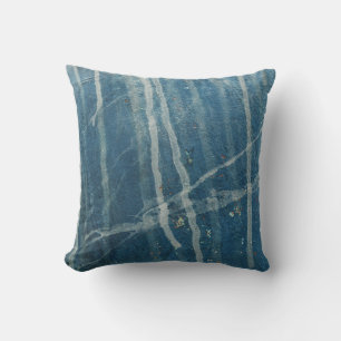 Closeup photo of blue wall paint cushion
