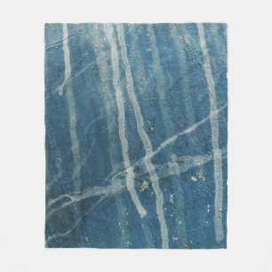 Closeup photo of blue wall paint fleece blanket