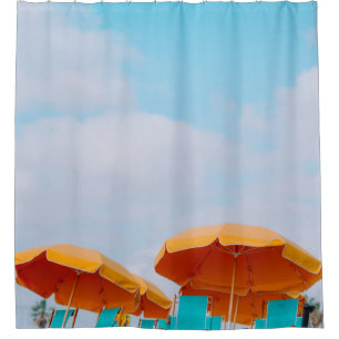 Closeup photo of lounger chairs and beach umbrella shower curtain