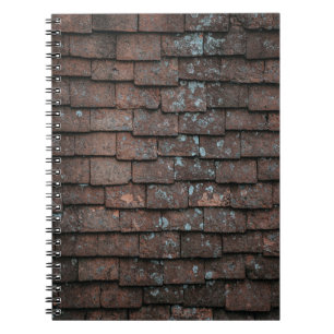 Closeup photography of brown and grey concrete bri notebook