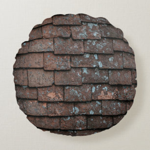 Closeup photography of brown and grey concrete bri round cushion